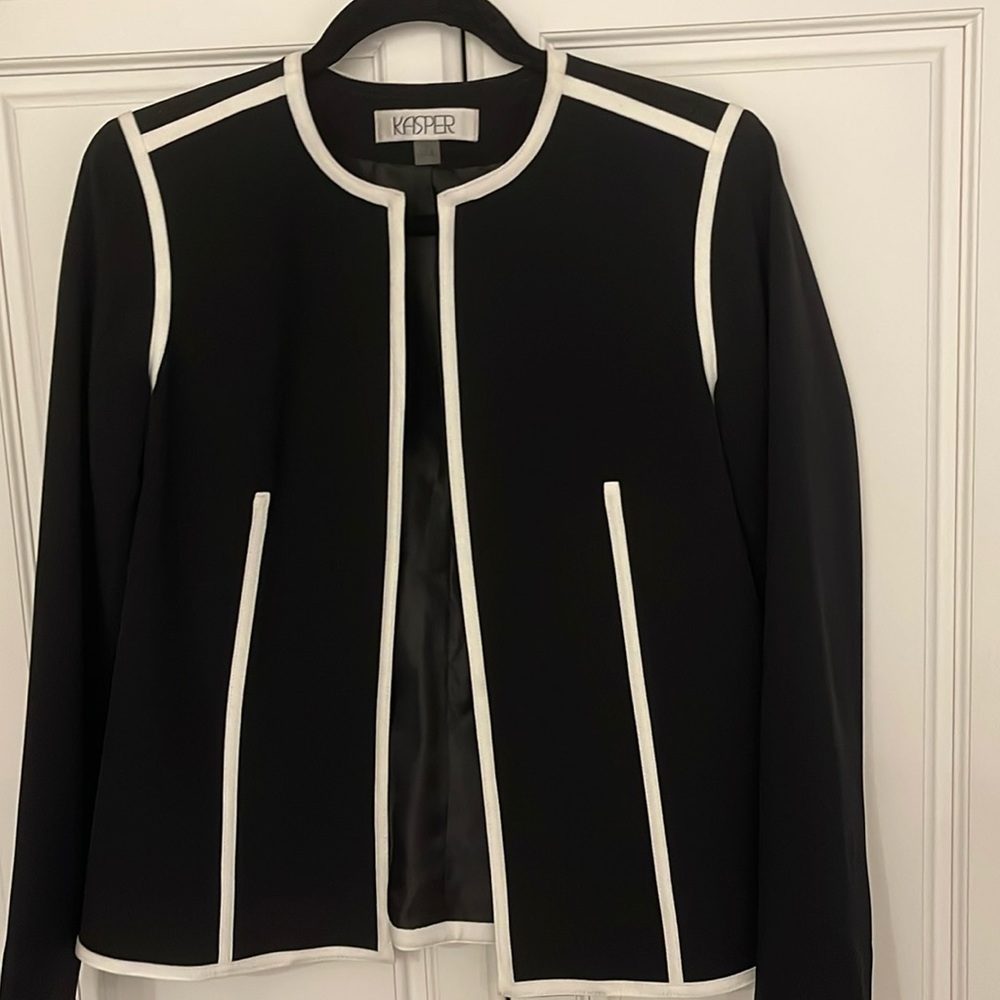 Woman’s suit jacket, size 4